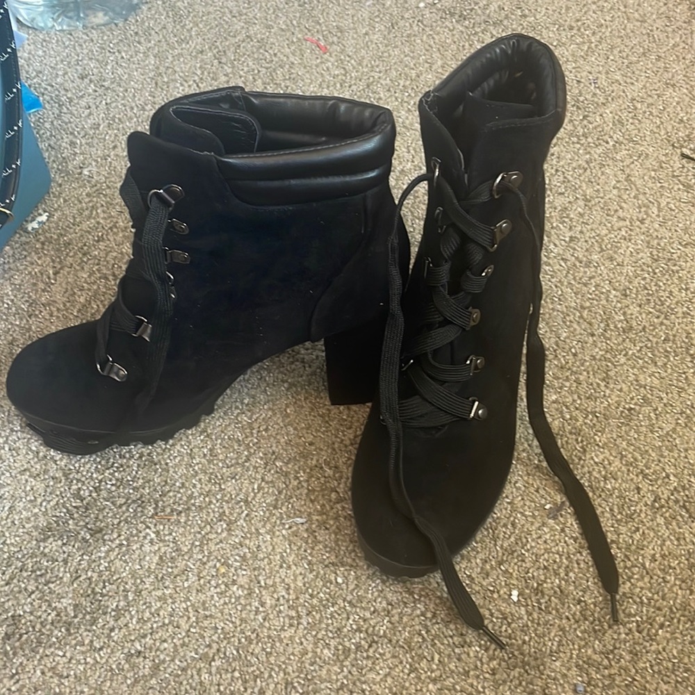 Black wedge boots.
